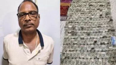 Rain of 'black money'; Chief engineer throws bundles from flat window during raid