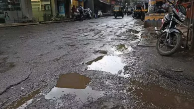 Former BJP corporator fills potholes