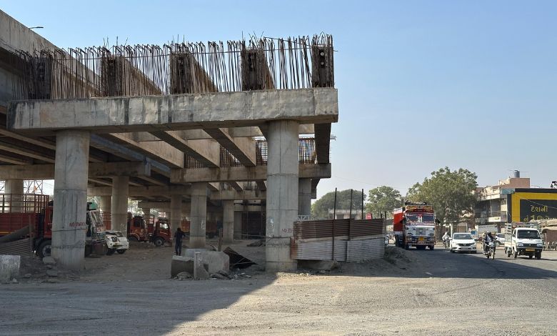 How much work has been completed on the Rajkot-Ahmedabad six-lane highway? Find out what information was given in the Lok Sabha.