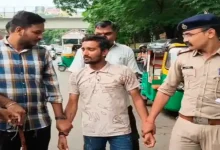 A young man being arrested by police officers.