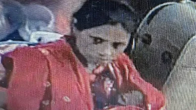 CCTV footage of a woman with a baby in a Mumbai local train