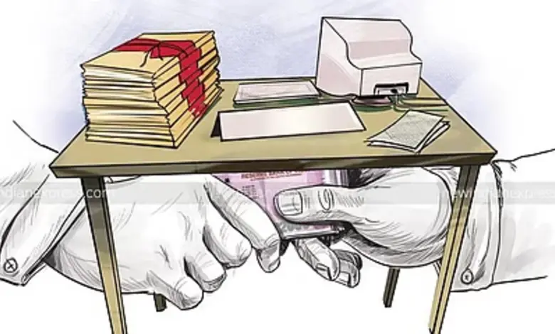 Government employee caught taking bribe