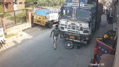 Father jumps under truck to save son, watch viral video of son lifting father