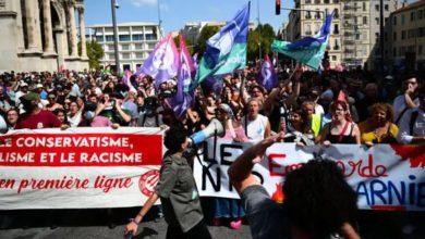 Thousands of people gather in France to protest against government; Eiffel Tower closed