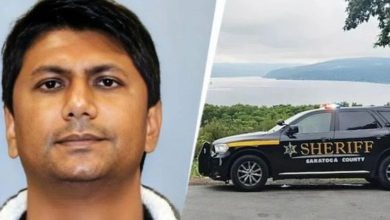 Mugshot of a young Gujarati man arrested in New York for 'job theft' or moonlighting, facing up to 15 years in prison.