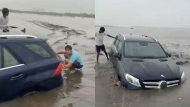 Mercedes stuck on Dumas Beach in Surat, crane had to be called to pull it out
