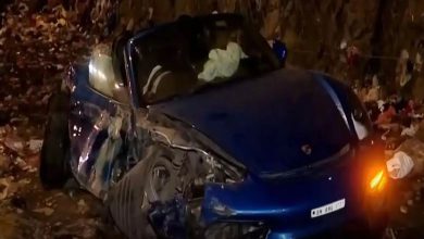 Porsche car collides with divider during race with BMW: Two injured