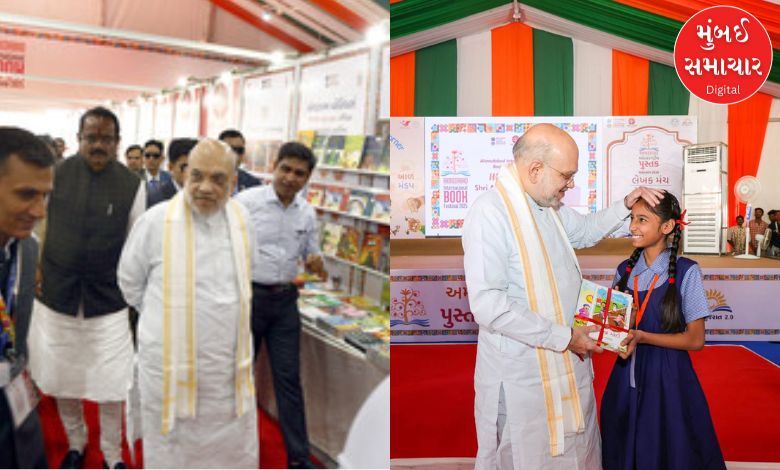 What did Amit Shah write on the register wall at the Ahmedabad International Book Festival?