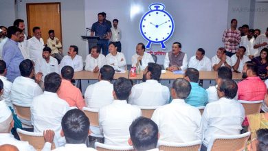 Deputy Chief Minister Ajit Pawar holding a meeting with NCP workers in Pune, stressing the need to reduce factionalism amidst the Mahar Watan land purchase case controversy