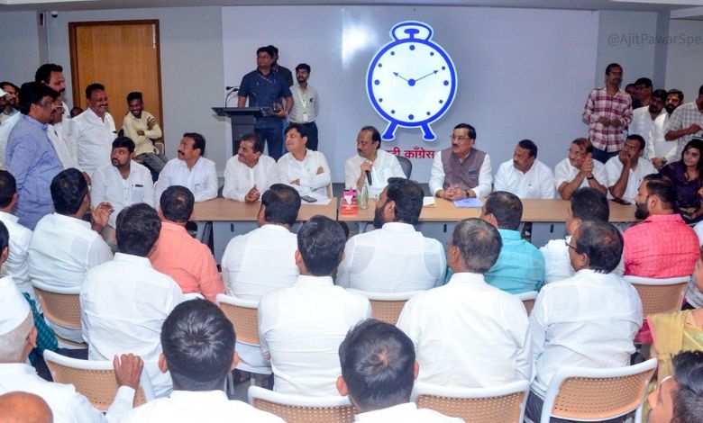 Deputy Chief Minister Ajit Pawar holding a meeting with NCP workers in Pune, stressing the need to reduce factionalism amidst the Mahar Watan land purchase case controversy