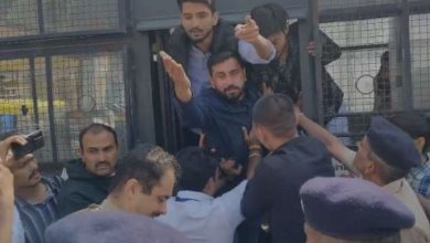 NSUI activists staging a fierce protest during the Chief Minister's program in Rajkot against the mandatory inclusion of teachers in the SIR (Special Intensive Revision) voter list exercise.