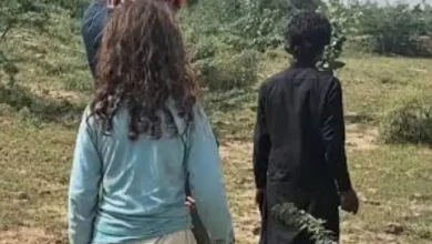 BSF personnel detain a Pakistani couple during an infiltration incident at the India-Pakistan border near Kutch.