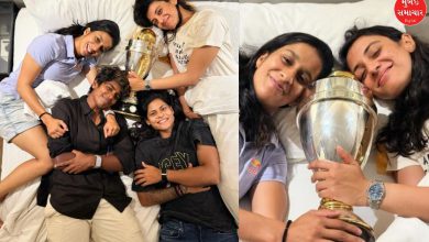 World champions strike a unique pose with the cherished trophy