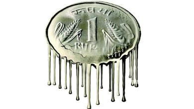 Indian rupee hitting a record low against the US dollar in the forex market