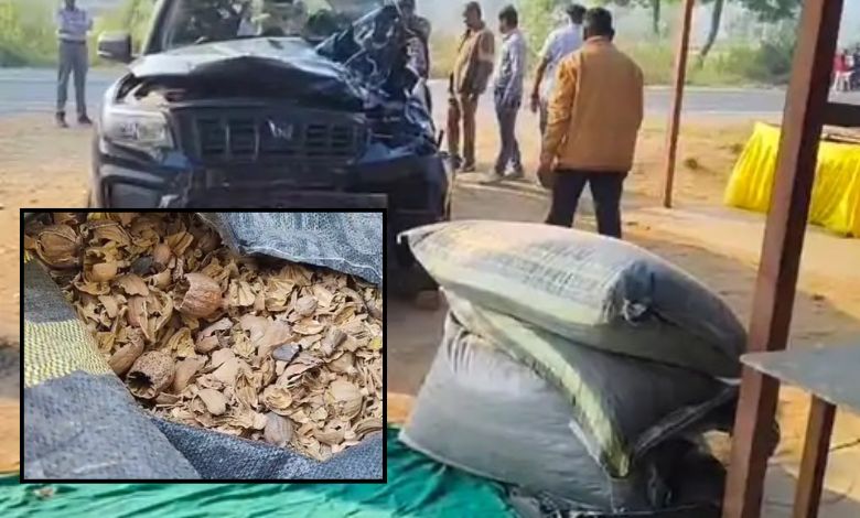 Police inspecting a damaged Scorpio car involved in an accident that led to the discovery of Posh Doda in Santrampur