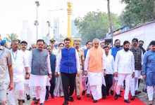 Crowds and leaders paying tribute to Dr. Babasaheb Ambedkar at Chaityabhoomi on Mahaparinirvan Din in Mumbai.