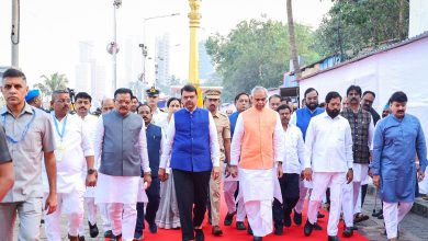 Crowds and leaders paying tribute to Dr. Babasaheb Ambedkar at Chaityabhoomi on Mahaparinirvan Din in Mumbai.