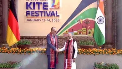 PM Narendra Modi and German Chancellor Friedrich Merz flying kites together at Sabarmati Riverfront, Ahmedabad.