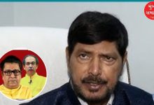 BJP and Mahayuti workers celebrating with orange flags outside the BMC headquarters in Mumbai.