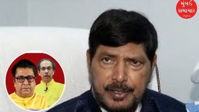 BJP and Mahayuti workers celebrating with orange flags outside the BMC headquarters in Mumbai.