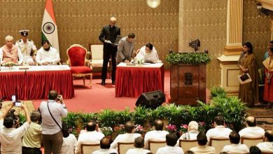 Sunetra Pawar taking oath as the first woman Deputy Chief Minister of Maharashtra in a formal ceremony.