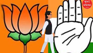 Mahendrajit Singh Malviya during his official rejoining ceremony with the Congress party flag.