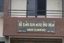 MLA J.V. Kakadia and BJP workers congratulating Bhumiben Vala with sweets and flowers.