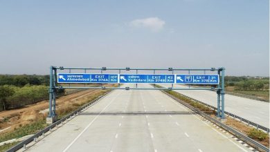 How were the toll tax rates determined for different places on the Delhi-Mumbai Expressway, starting from Surat?