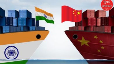 Cargo ship with Indian and Chinese flags representing bilateral trade growth.