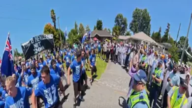 Nagar Kirtan procession and religious symbols representing the Sikh community.