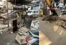 BMC workers removing illegal scrap shops on South Mumbai footpaths