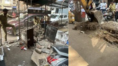 BMC workers removing illegal scrap shops on South Mumbai footpaths