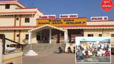 Villagers of Jetalsar sitting on a symbolic fast near the historic railway station building